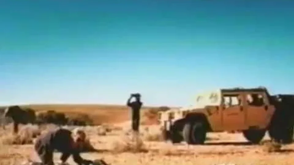Frame from the Just for Feet Super Bowl commercial (1999)
